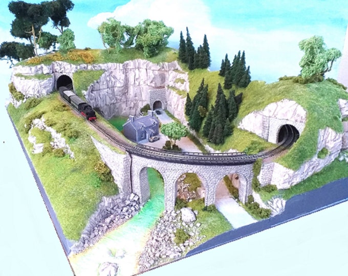 Fabulous scenic woodland valley model railroad in N scale.