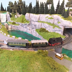 Model Railway With a Realistic Forest Mountain Layout, With Lakes and ...