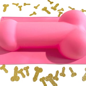 One Woman Tries To Get A Second Use Out Of Her Penis-Shaped Cake Tin But  They Still All Look Like Willies 
