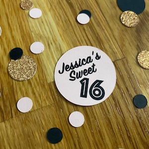May include: Pink and gold confetti with a pink circle that says "Jessica's Sweet 16" in black text.