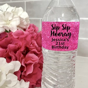 May include: Pink glitter water bottle label with the text "Sip Sip Hooray Jessica's 21st Birthday".