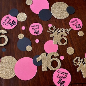 May include: Gold glitter confetti with pink and black circles and the text "Happy Sweet 16" and "Sweet 16" in black and gold glitter.