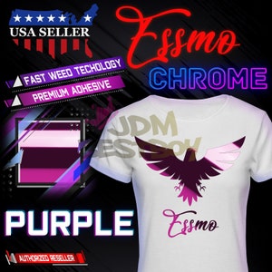 May include: Purple chrome iron-on vinyl with the text "Essmo Chrome" in pink and white. The vinyl is shown on a white t-shirt with a purple eagle graphic. The text "JDM EST SOY" is visible in the background.