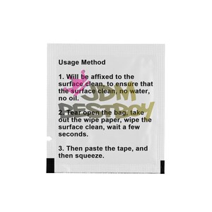 May include: A small, white packet with black accents and printed instructions. The text reads "Usage Method" followed by numbered steps for surface preparation. The packet also features the word "DESTROY" in a stylized font.