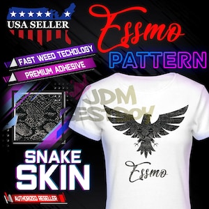 May include: A white t-shirt with a black snake skin patterned eagle design. The text "Essmo Pattern" is written in red and purple above the eagle. The text "Essmo" is written in black below the eagle. The text "JDM Esso" is written in white on the shirt. The text "Snake Skin" is written in white on a black background with a purple and pink border.