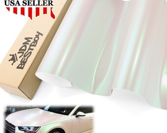 May include: A roll of iridescent car wrap film with a pearlescent finish. The film is shown next to a cardboard box with the text "JDM BESTBOY" and "USA SELLER". A white car with the same film is shown in the bottom corner.