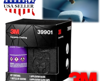 May include: A black box with the 3M logo and the text "Ceramic Coating" and "39901". The box contains a purple bottle of ceramic coating and a black applicator block. The kit contains 1 bottle of coating, 1 applicator block, and 8 applicator cloth caps.