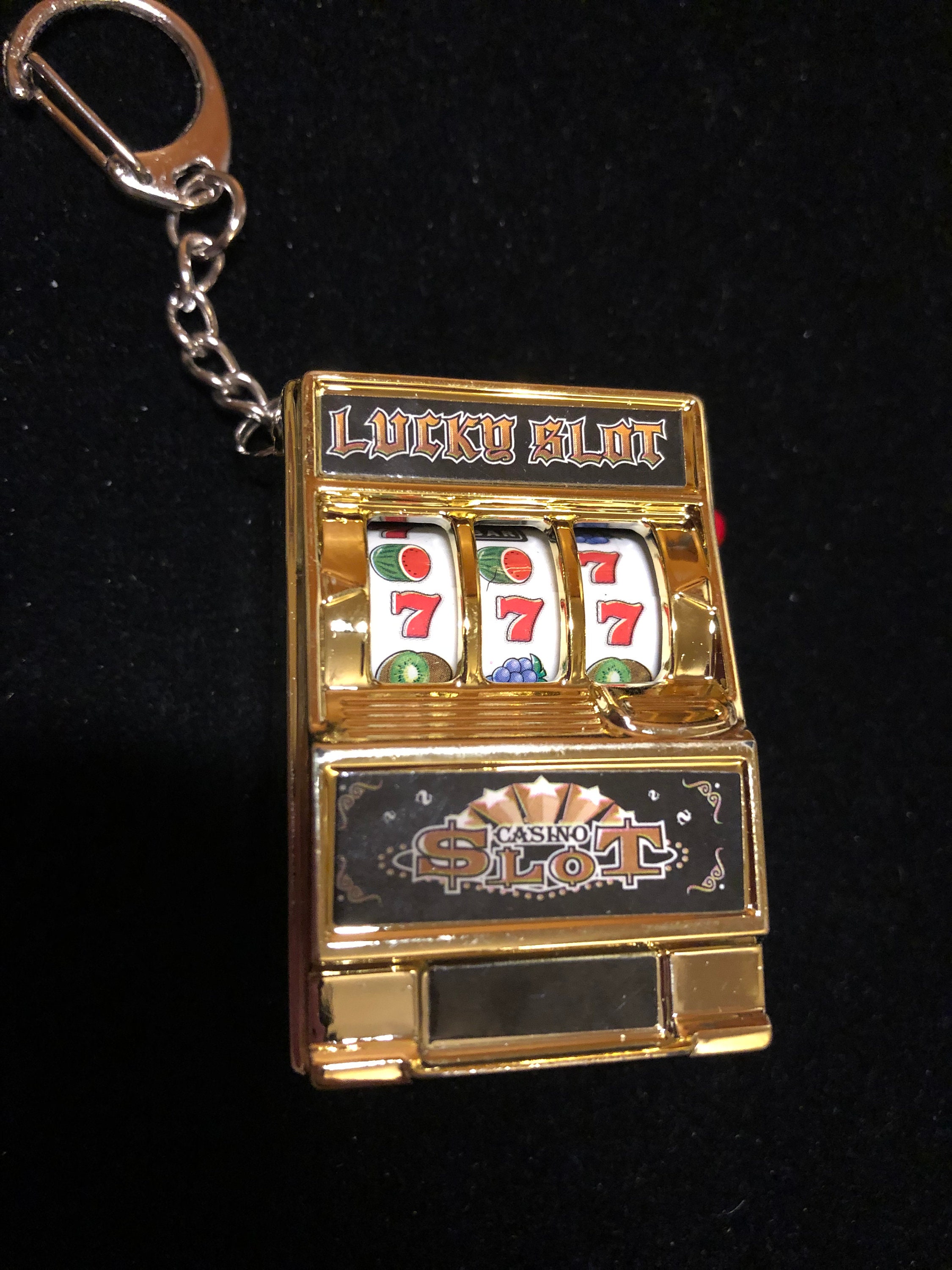 777 Las Vegas Jumbo Slot Machine Casino Toy Piggy Bank Replica with Flashing Lights and Jackpot Alert Sounds and Free Working Gold Slot Keychain