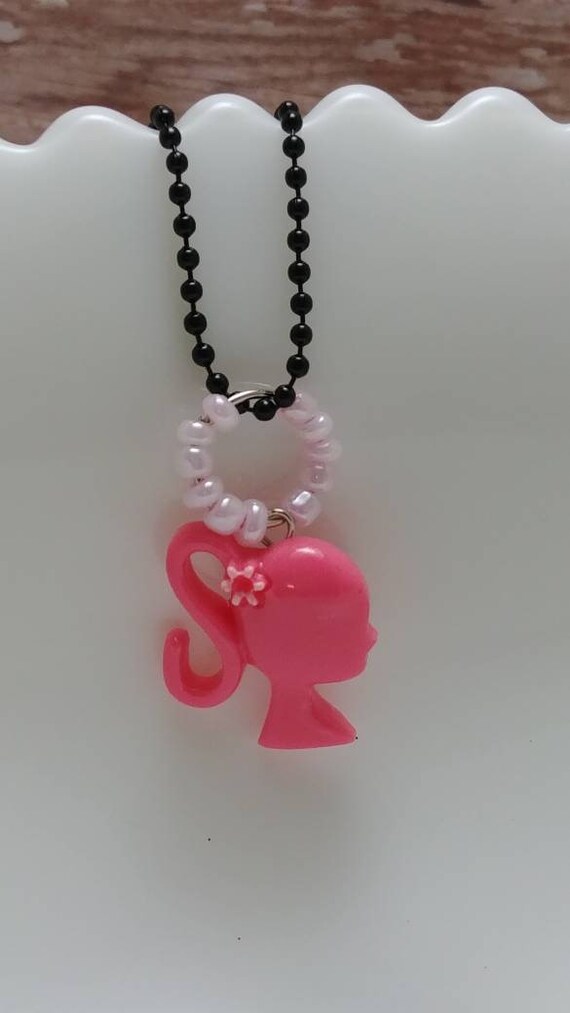 barbie silhouette necklace