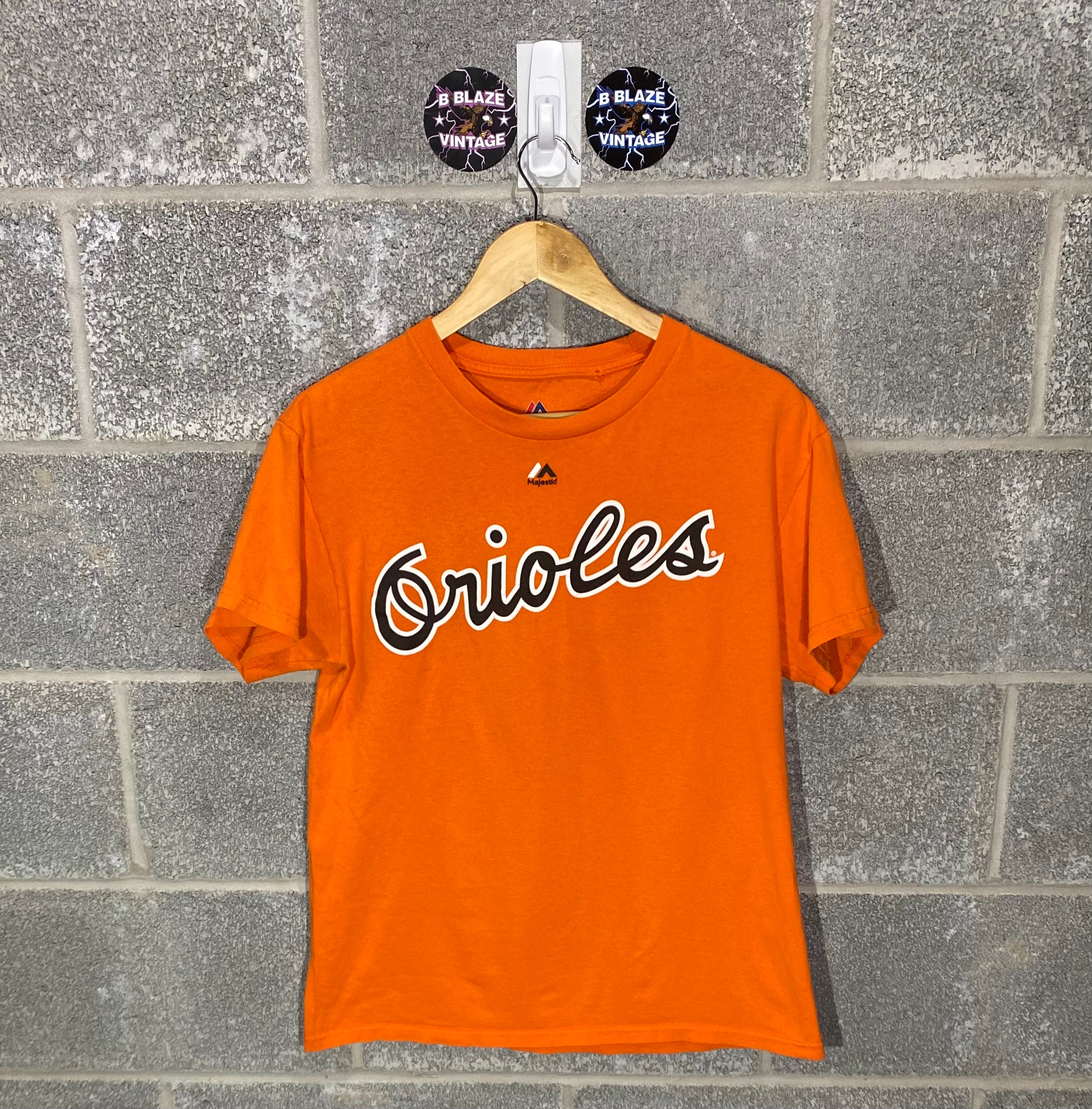 Discover Vintage Y2K 2000s Baltimore Orioles Cal Ripken Jr. Jersey Style Graphic T-Shirt.