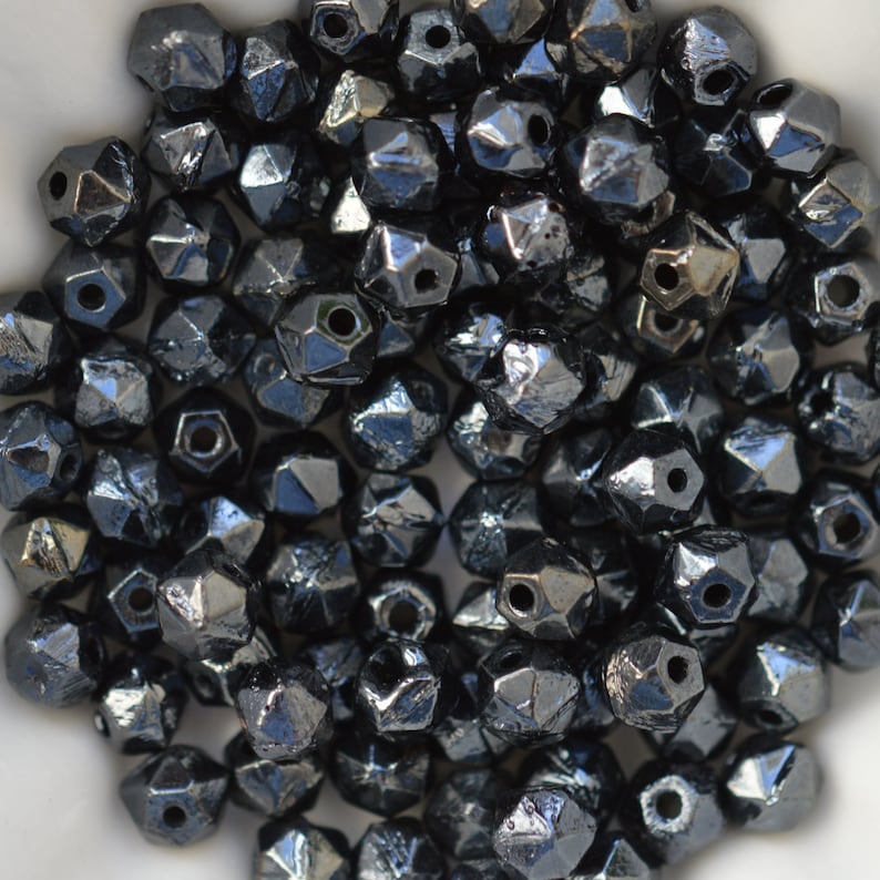 Lot de 50 perles à facettes 4mm or