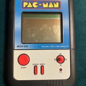 Pac Man Classic Electronic Handheld LCD Game Collectible