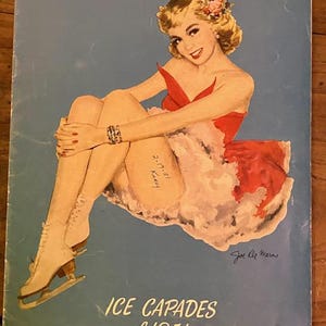 May include: Vintage poster for "Ice Capades of 1951" featuring a woman in a red dress and ice skates. The poster has a light blue background with text and a 25-cent price tag.