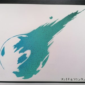 May include: A teal and blue spray paint stencil of the Final Fantasy VII logo. The logo is a stylized comet with a large, round head and a long, thin tail.