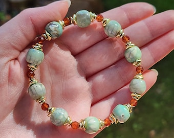 Chunky Gold Hematite, Orange Garnet, and Robins Egg Agate Beaded Crystal Bracelet