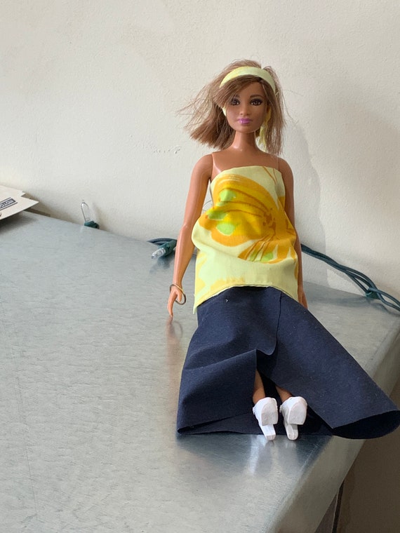 Navy blue skirt top and yellow shirt