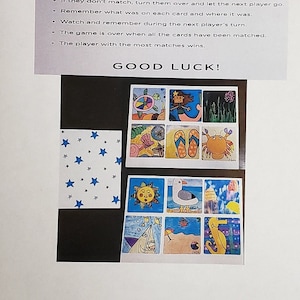 May include: A children's matching game with 24 cards featuring colorful illustrations of various objects and creatures. The game includes instructions and the text "MATCH GAME" and "GOOD LUCK!"