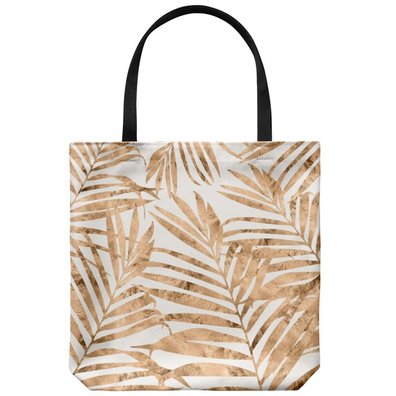 white and gold beach bag