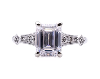 14 karat white gold Emerald Cut Moissanite Engagement Ring