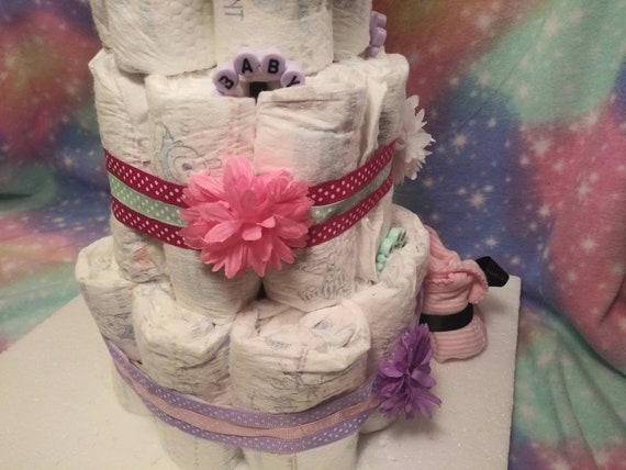 pink and purple diaper cake