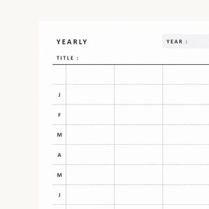 May include: A white yearly planner page featuring black text with the headers YEARLY and YEAR. The layout includes a TITLE line and a grid with rows labeled with the letters J, F, M, A, M, J, representing the first six months of the year.