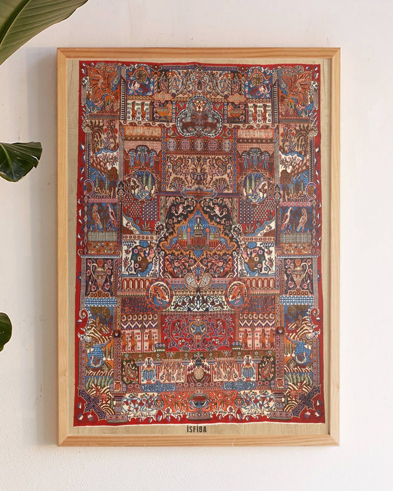 May include: A framed print of a colorful, intricate rug with a geometric design. The rug is red, blue, green, and yellow. The frame is made of wood and has a natural finish. The print is titled "Isfiba".