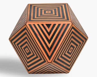 May include: A geometric wooden stool with a black and brown striped pattern. The stool has a hexagonal shape and is made of wood.