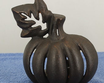 Cast Iron Pumpkin-Shape Candle Holder. Hold up to 1 3/4" diameter short candle