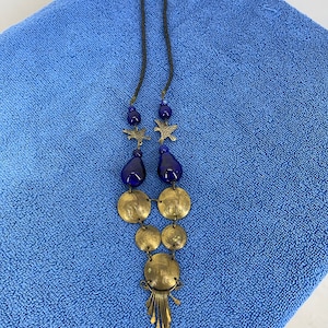 Vintage necklace with Blue stones and Peruvian Un Sol De Oro coins. 1967 and 1974 coins