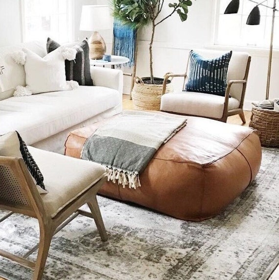 Square leather pouffe deals
