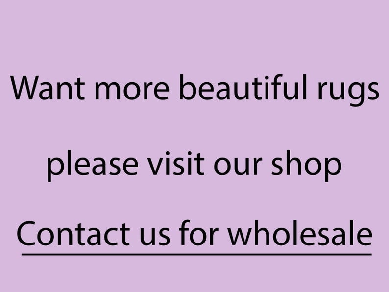 May include: Text on a purple background that reads: "Want more beautiful rugs please visit our shop Contact us for wholesale"