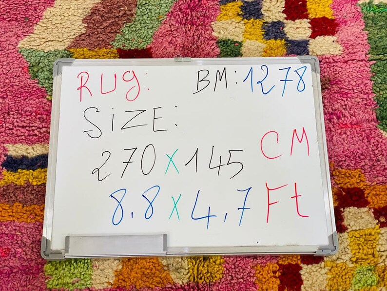 May include: Whiteboard with the text "Rug: BM:1278 Size: 270 x 145 CM 8.8 x 4.7 Ft"