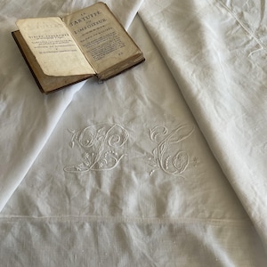 Antique French very large linen hand embroidered pillow case, monogrammed LC, scalloped trim with flaws.