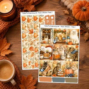May include: Two sticker sheets featuring autumn-themed illustrations of cats, pumpkins, and fall foliage. The sheets include text reading StellarFoxStudio.etsy.com - Rustic Whiskers - Page 1 and Page 2, along with various cat scenes and decorative borders.
