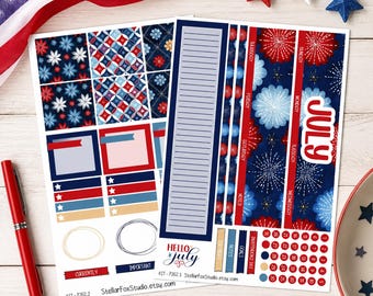 May include: Two sheets of planner stickers featuring a red, white, and blue patriotic theme. The designs include floral patterns, geometric shapes, a July calendar, firework illustrations, and text reading Hello July and Independence Day.