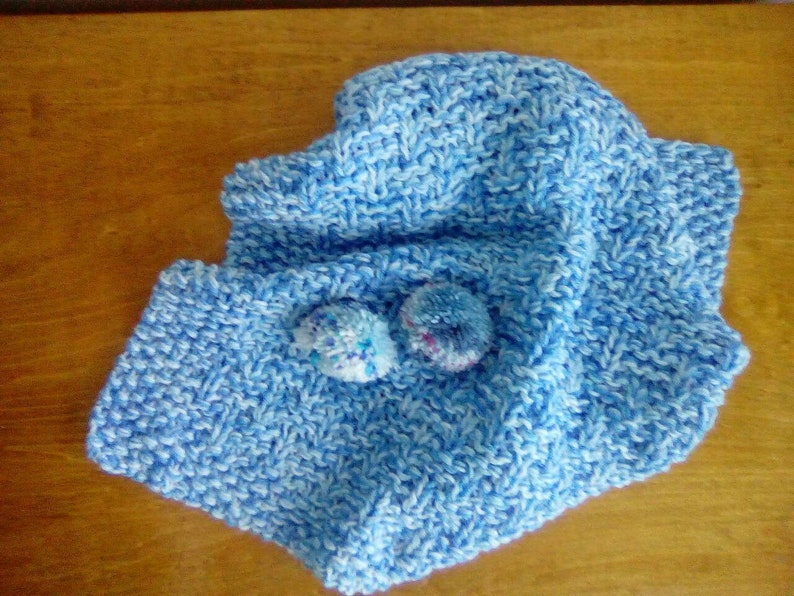 Chunky knit baby blanket suitable for buggy or car seat.