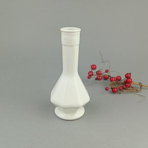 Small white ceramic vase
