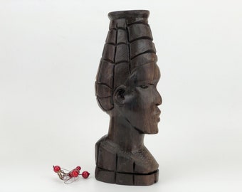 Serious looking man vintage wood figurine