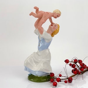 Mother holding her child Porcelain figurine by Porzellanfiguren Gräfenthal (Ehemals Carl Scheidig), mid 20th century  made in GDR