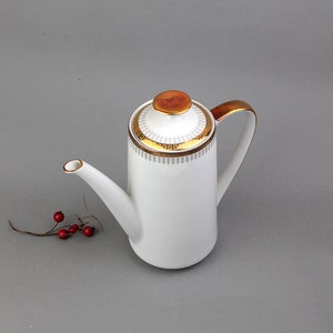 Large white vintage fine porcelain coffee pot decorated with gilded ornaments by Winterling, Bavaria.