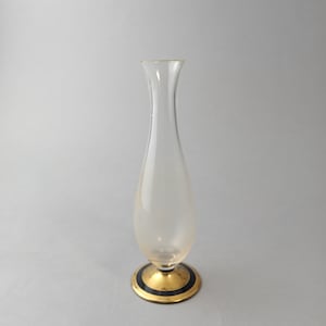 Vintage clear glass vase with a gilded base