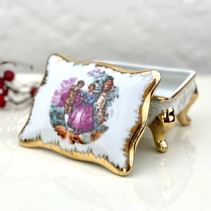 Beautiful decorated in gold porcelain box for storing jewellery, vintage from Europe