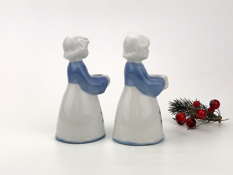 Porcelain set of two women holding bowls Christmas decor