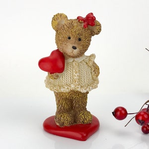 Small desktop vintage plastic girl teddy bear figurine. Made in Europe