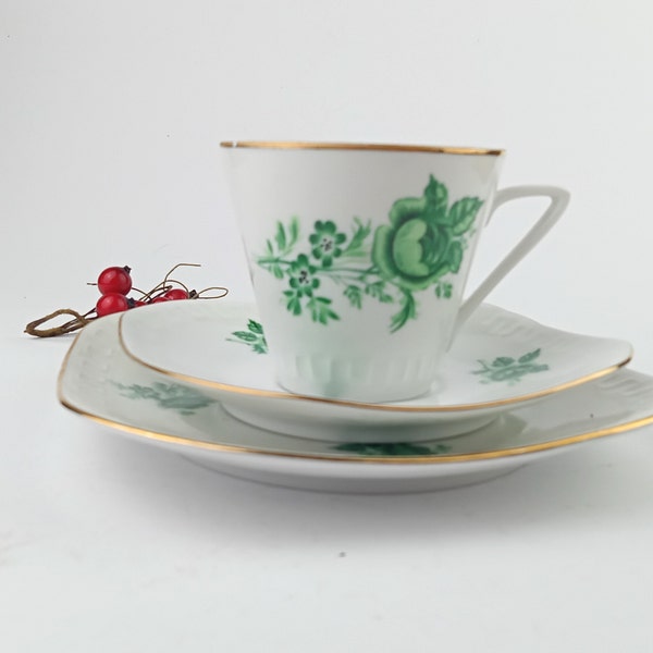 This is Polish coffee set with cup, saucer and dessert plate, made of Wawel white porcelain