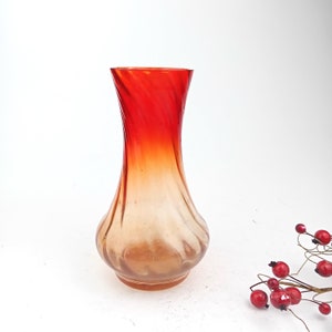 Beautiful handmade  vintage blown glass flower vase. Bent technique. Glass with two tones.