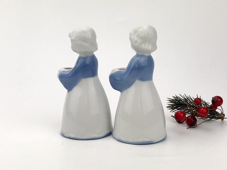 Porcelain set of two women holding bowls Christmas decor