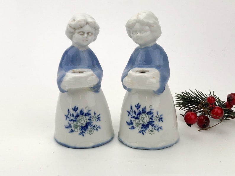 Porcelain set of two women holding bowls Christmas decor