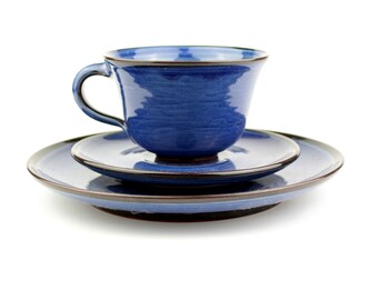Juego de té de cerámica vintage de esmalte azul.