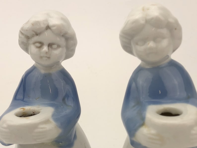 Porcelain set of two women holding bowls Christmas decor